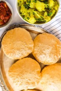 Puree ( thin, deep fried bread) Popadoms Indian Restaurant